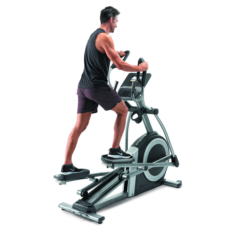 Nordic Track Commercial Elliptical Cross Trainer in use by male model