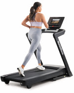 Nordic Track EXP 10i Treadmill with female running view from an angle