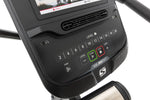 Spirit XBU55 ENT Upright Bike with Touch Console showing angled view of level buttons and fan.