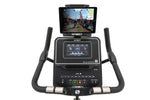 Spirit XBU55 Upright Bike close up of console with tablet with downloaded app clamped in tablet holder.