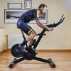 An image taken from the side of the BH Exercycle Smart bike showing a man exercising. Fitness Options, Online Gym Equipment Supplier and Nottinghamshire Showroom