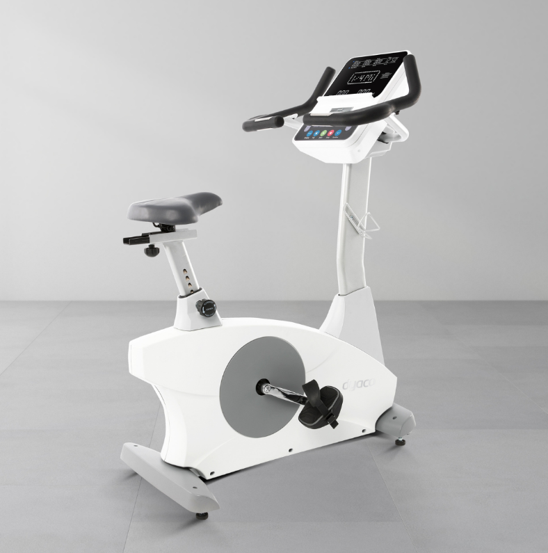 Dyaco Medical Physical Therapy Upright Bike 4.0U viewed from a angled rear position with no one on it. 