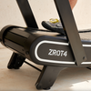 Close up of front of Bodytone ZROT4 Light Commercial Curved Treadmill with persons foot showing