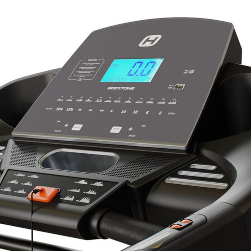 Close-up of a Bodytones DT18+ treadmill LED control panel with digital display and various buttons.