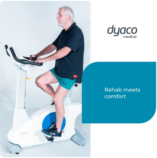 Dyaco Medical Physical Therapy Upright Bike 4.0U side view with patient pedalling and the phrase rehab meets comfort. 