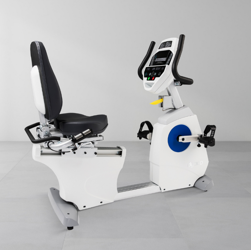 Dyaco Medical Rehabilitation 7.0R Recumbent Bike slightly angled side view with no one on it.
