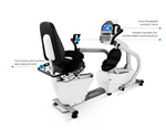 Dyaco Medical Rehabilitation Recumbent Seated Stepper 7.0S angled side view. Also has lines pointing to the seats horizontal and recline adjustments, workout data on console and rotating upper body handles.