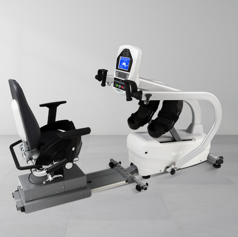 Dyaco Medical Rehabilitation Recumbent Seated Stepper 7.5S rear angled view with no one on it.