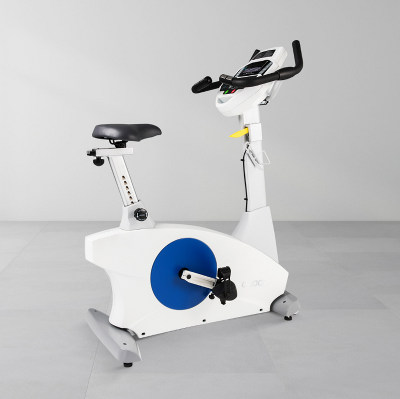 Dyaco Medical Rehabilitation Upright Bike 7.0U angled side view with no one on it.