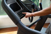 Horizon 7.4AT treadmill with model pressing quick keys in room setting