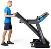 Horizon 7.0AT @Zone Treadmill showing male folding treadmill