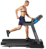 Horizon 7.0AT @Zone Treadmill with male runner view from the side