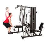 Horizon Torus 5 Gym with male model performing bent over row