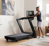 Nordic Track 1250 Treadmill console being pivoted by male in room