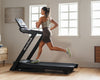 Nordic Track EXP 10i Treadmill with female running on it in the flat position