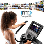 Nordic Track Freestrider Trainer FS10. Image of a female on the Freestrider with a banner above advertising that it is iFIT compatible.