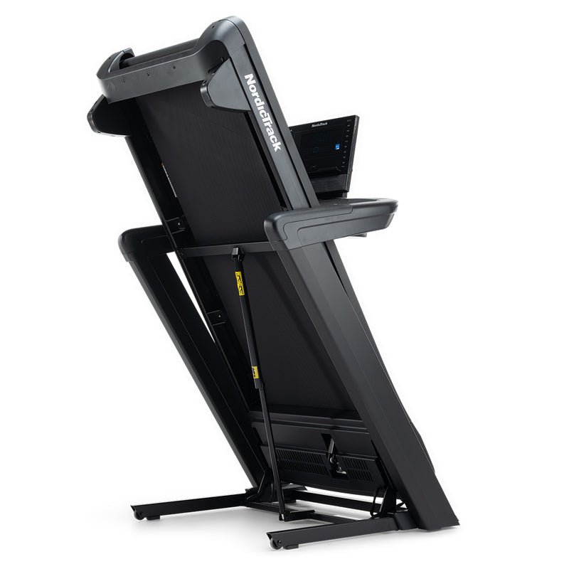 NordicTrack Commercial LE Treadmill folded against white background.