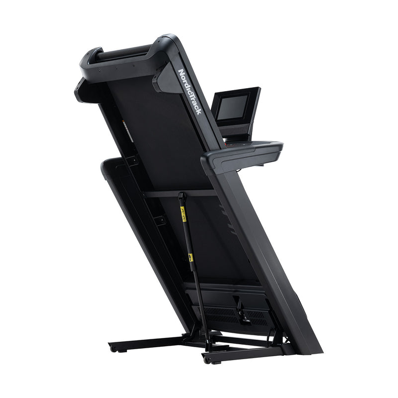 Nordic Track Commercial 1250 Treadmill folded against white background