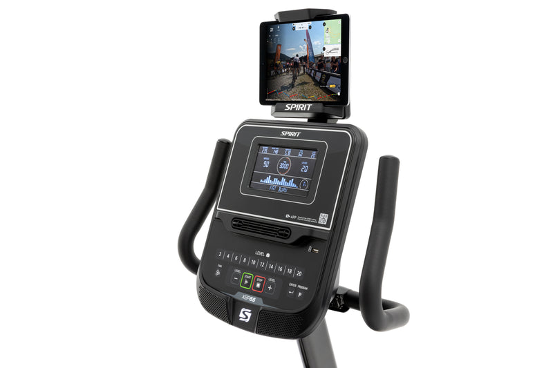 Spirit XBR55 Recumbent Bike  angled view of hand grips and black LCD console with tablet attached to the tablet holder.