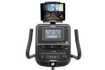Spirit XBR55 Recumbent Bike close up of black LCD console with tablet showing app, clamped into tablet holder 