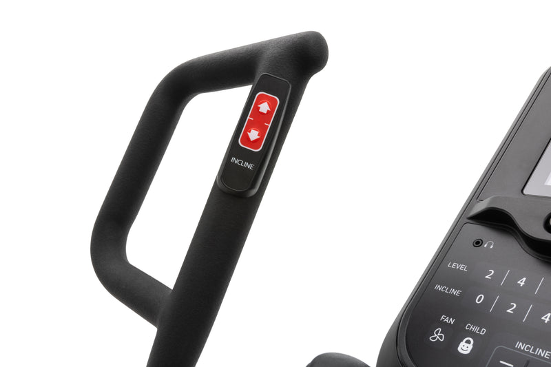 Spirit XE 395 ENT Elliptical Trainer. A close up image of the incline control button on the left hand handle bar.
