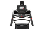 Spirit XT485 ENT Treadmill with Touch Screen showing console, incline and speed toggles on handle bars, hand grip pulse and  speed and incline buttons.