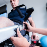 Dyaco Medical Rehabilitation Recumbent Seated Stepper 7.0S close up of therapists hand changing the length of the upper body handles. 