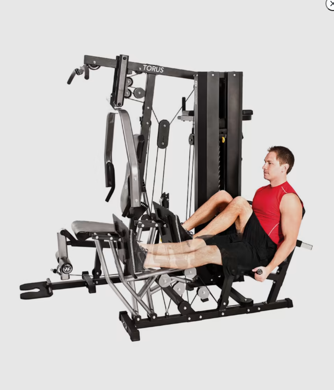 Horizon Torus 5 Gym with male model performing Leg Press