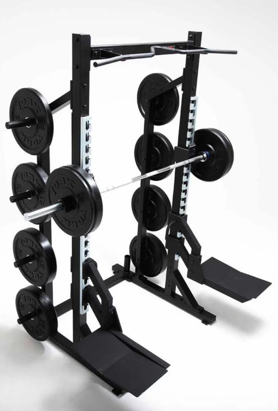 York Barbell Olympic Half Rack with vertical bar storage holders loaded with bars and Olympic plates which are not included in price