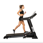 Woman running on a Bodytone DT22W TFT Treadmill  with 'Bodytone' branding on a white background