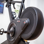 A close up image of the flywheel at the rear of the BH Exercycle Smart Bike.  Fitness Options, Online Gym Equipment Supplier and Nottinghamshire Showroom