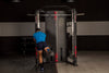 An image of a man working oput on the BH G160 Rack Smith performing a kick back exercise. Fitness Options. Nottingham's leading fitness & gym equipment supplier.