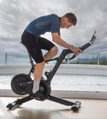 Image of a man working out on the BH Exercycle Smart bike. Fitness Options. Nottingham's leading fitness & gym equipment supplier.