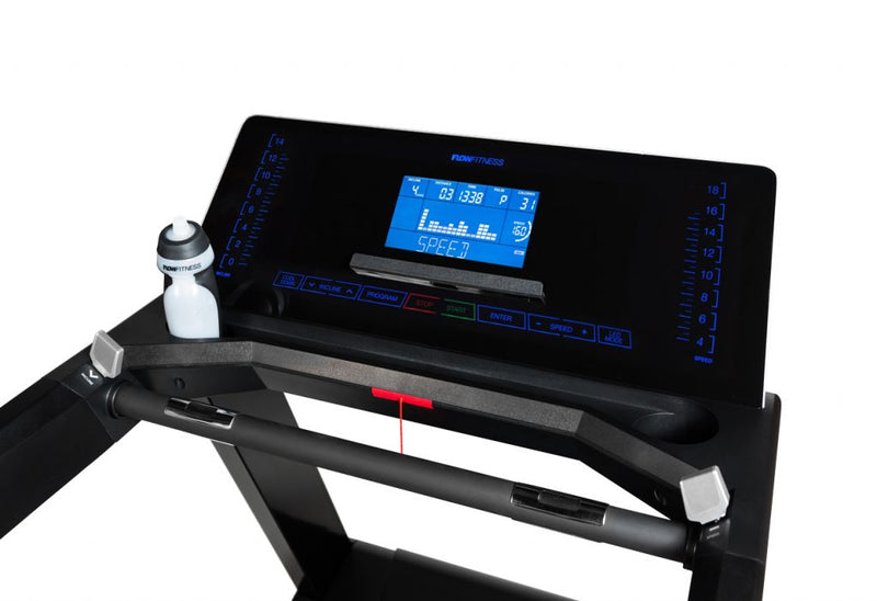 A close up view of the Flow Fitness T3i treadmill console with water bottle in the waterbottle holder. Fitness Options. Nottingham's leading fitness & gym equipment supplier.