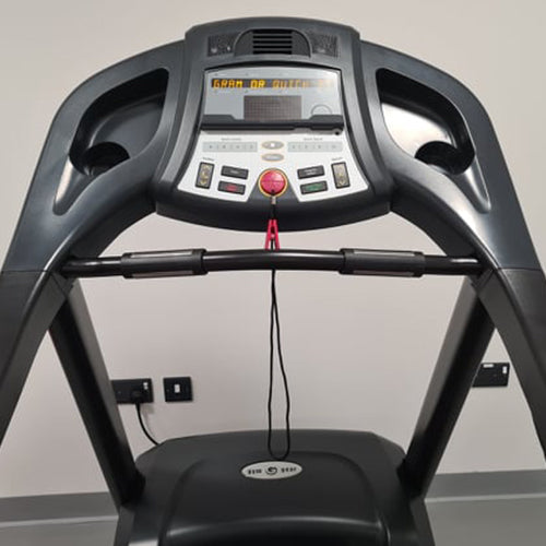 Gym Gear T95 Home and Light Commercial treadmill console close up showing scrolling readout, operating buttons, safety key and cooling fan.