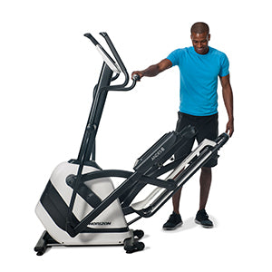  Side view of a man in the process of folding the Horizon Andes 3 cross trainer. Fitness Options, Online Gym Equipment Supplier and Nottinghamshire Showroom
