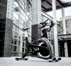 Image of the Spirit Johnny Gee bike in a courtyard setting.  Fitness Options, Online Gym Equipment Supplier and Nottinghamshire Showroom