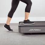 View of a person stepping onto the rear of a Life Fitness Club Treadmill.  Fitness Options, Online Gym Equipment Supplier and Nottinghamshire Showroom