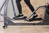 Image of the Life Fitness E1 Cross Trainer  pointing out the Whisper Stride technology.  Fitness Options. Nottingham's leading fitness & gym equipment supplier.