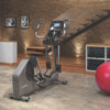 Image of the Life Fitness E3 cross trainer in a home gym setting.  Fitness Options. Nottingham's leading fitness & gym equipment supplier.