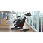 Image of the Life Fitness IC5 indoor training bike set in a loft apartment.  Fitness Options. Nottingham's leading fitness & gym equipment supplier.