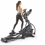 Female model using Sole E35 Fitness Elliptical Cross Trainer, available from Fitness Options, Nottinghamshire based Gym Equipment Supplier. Visit in store or buy online