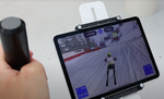 Close up of tablet with skiing app game attached to the Icaros tablet holder connected to the Icaros Home 