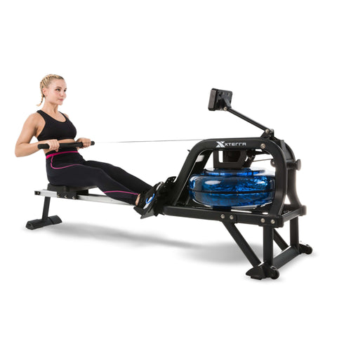 An image of a female working out on the Xterra ERG600W rower pulling the draw bar towards her. Fitness Options, Online Gym Equipment Supplier and Nottinghamshire Showroom